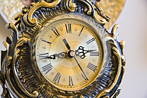 Antique goldish clock. photo