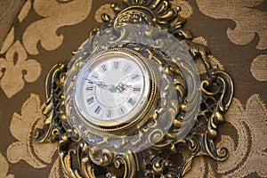 Antique goldish clock. photo