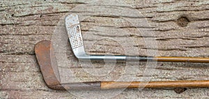 Antique golf clubs with wood shafts