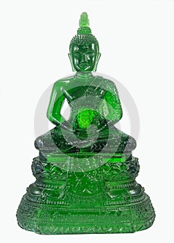 antique green emeral buddha statue , thai buddhist religion .