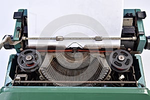 antique green typewriter, analogical typing.