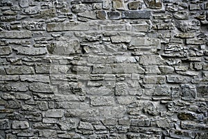 Antique grunge old gray stone wall masonry photo