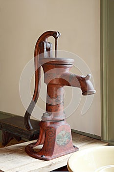 An antique Hand operated water pump