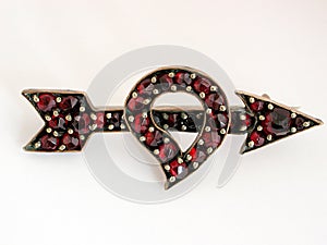 Antique heart and arrow brooch