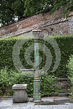 Antique Iron outdoor Waterpump photo