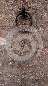 Antique Iron Ring On A Acient Stone Wall photo