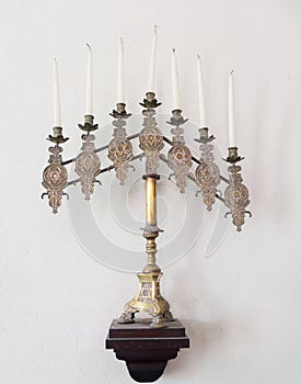Antique jewish menorah and candles