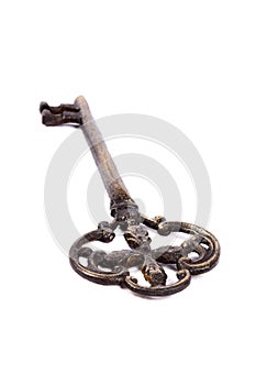 Antique key isolated on white background - photograph