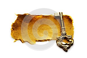 Antique key and paper