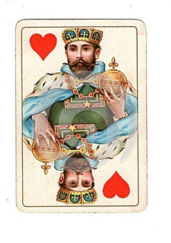 An antique king of hearts playing card.