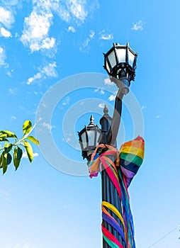 Antique lanterns decorated in the colors of diversity