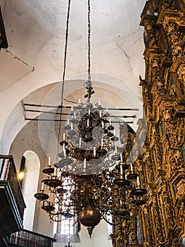 Antique large metal chandelier in an orthodox church