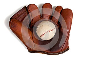 Antique leather baseball glove and ball