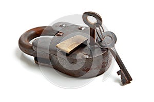 Antique lock with skeleton key on white