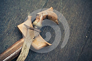 antique malay dagger or Keris on wooden floor.