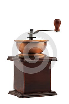 antique manual mechanical coffee grinder in a wooden case, isolated