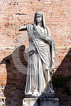 Antique marble statue of Vestal Vigin. House of Vestals at Roman Forum, Rome, Italy