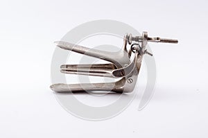 Antique metal gynecologic speculum.