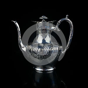 Antique metal teapot. silver tea service.