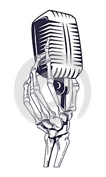 Antique microphone and skeleton hand