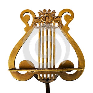 Antique music stand, bronze, on white background