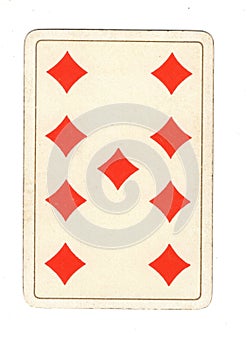 An antique nine of diamonds playing card.