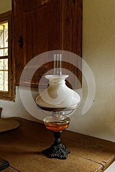 Antique Oil Lamp in Old Farmhouse