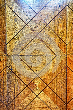 Antique old weathered wood floor parquet with diamond pattern as a background