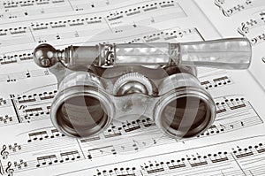 Antique Opera Glasses on a Music Score