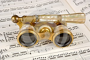 Antique Opera Glasses on a Music Score