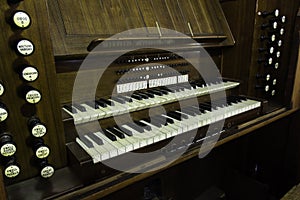 Antique organ manual stops wood