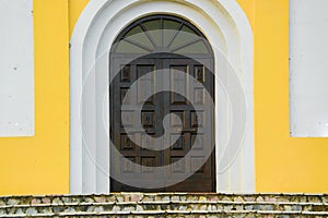 Antique ornate wooden church doorway