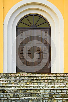 Antique ornate wooden church doorway