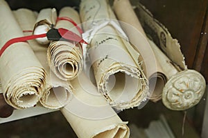 Antique parchments on a shelf