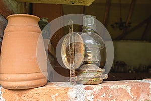 Antique petroleum lamp in an old barn.High quality photo.