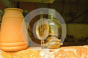 Antique petroleum lamp in an old barn.High quality photo.
