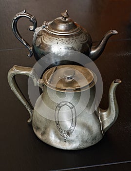 Antique pewter teapots photo