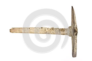 Antique pickaxe on white background photo