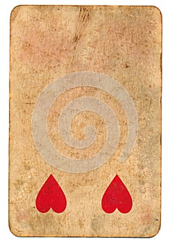 Antique playing card of hearts used paper background