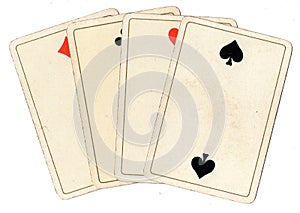 Antique playing cards showing four twos.