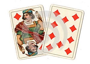 Antique playing cards showing a jack and ten of diamonds.