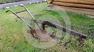 An antique plow on display in alaska