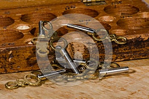 Antique Pocket Watch Keys Scattered on the Watchmakerâ€™s Bench