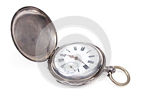 Antique pocket watch on white background