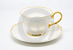 Antique porcelain tea cup on white background