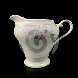 Antique porcelain vase with floral pattern.