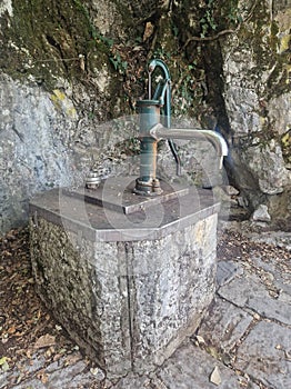 Antique pump for pumping out spring water