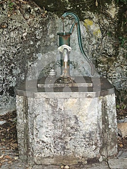 Antique pump for pumping out spring water
