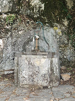 Antique pump for pumping out spring water