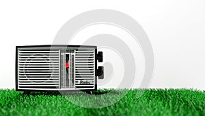 Antique radio transistor on grass
